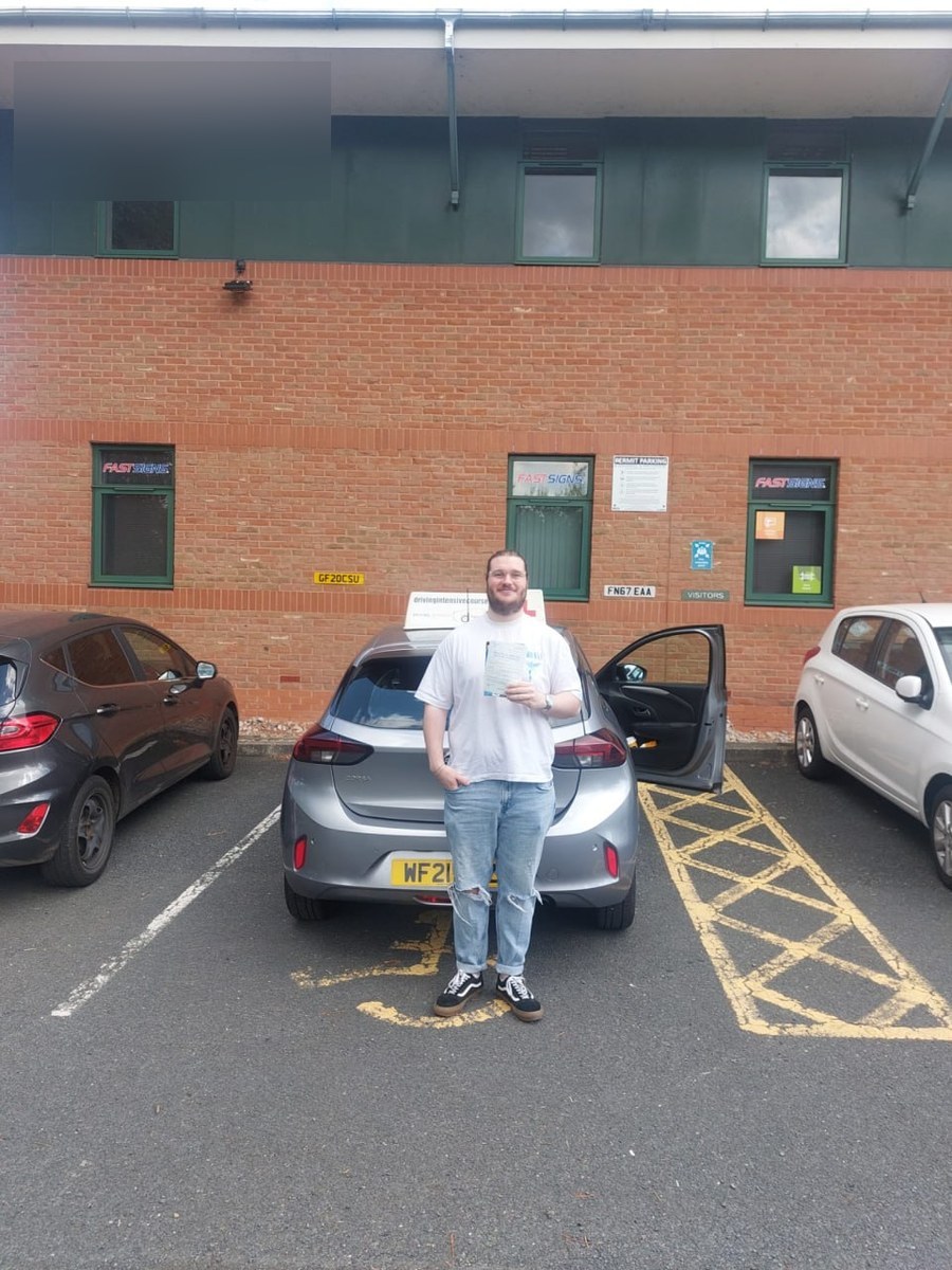 Learner celebrating a recent practical-test pass