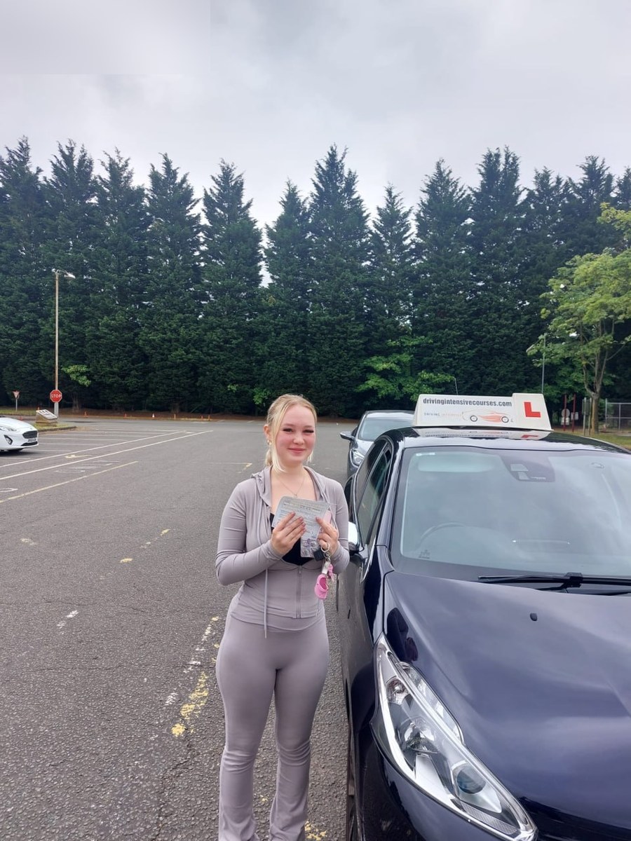 Learner celebrating a recent practical-test pass