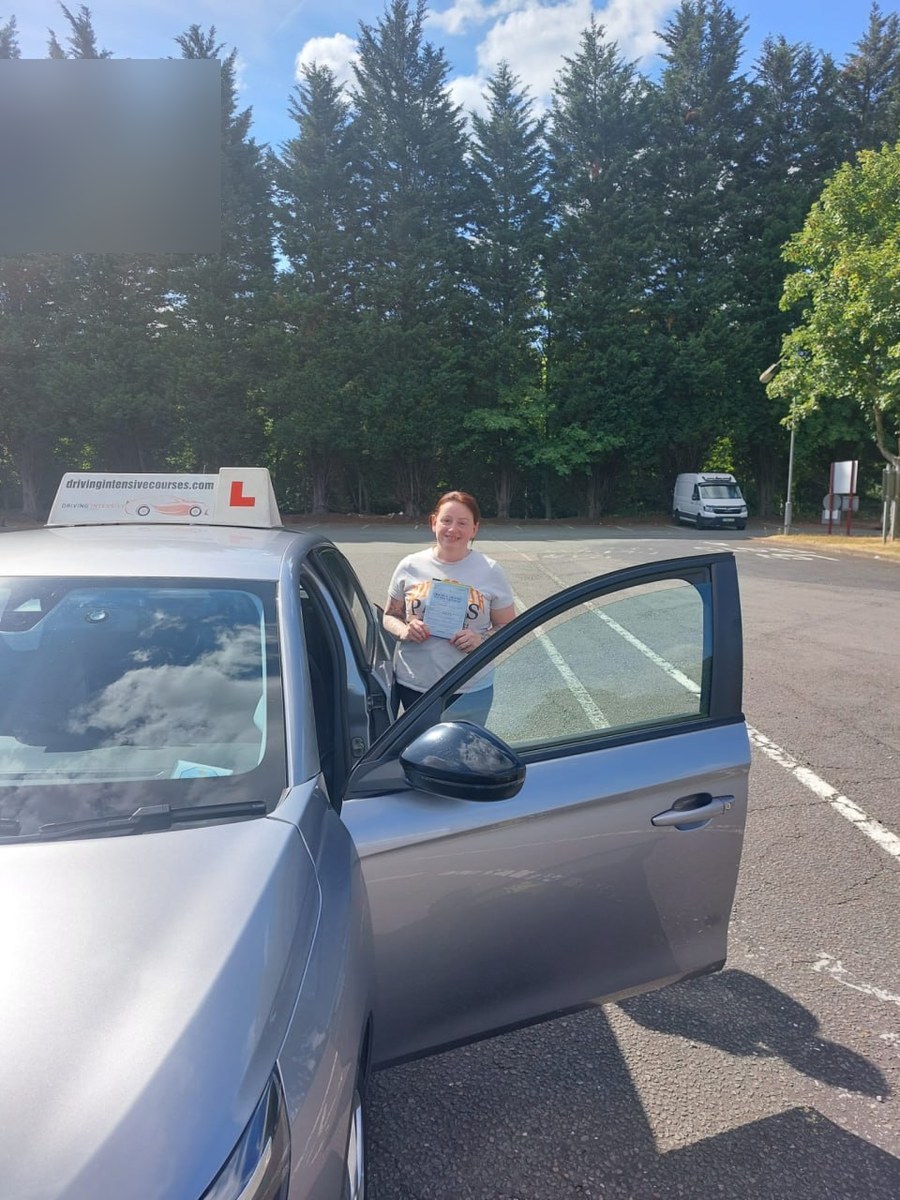 Learner celebrating a recent practical-test pass